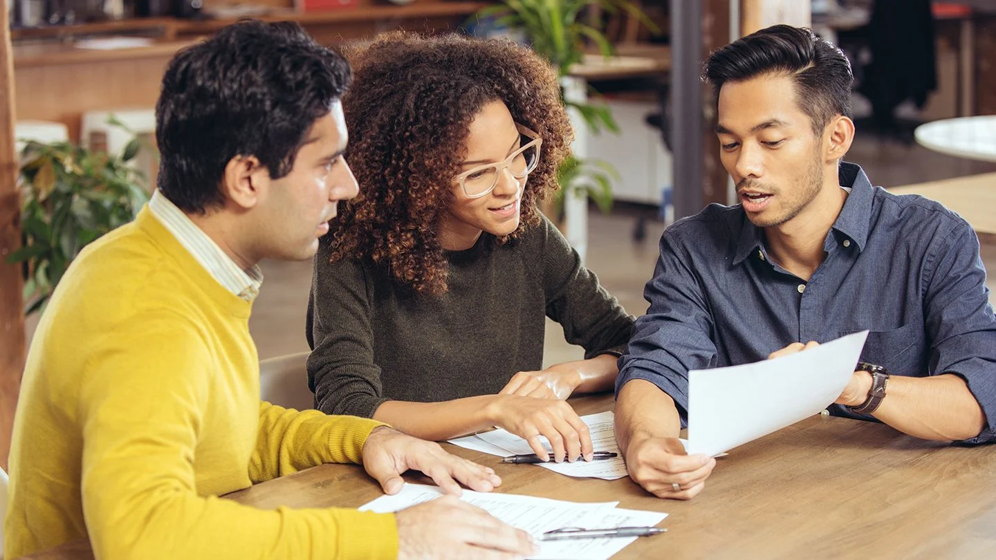 Agent reviewing paperwork with a seller